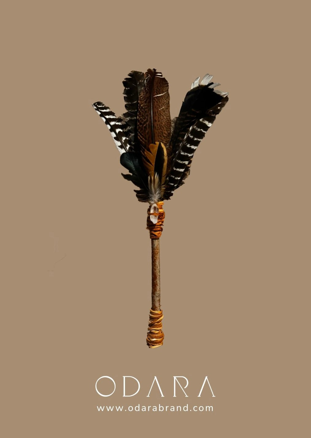 Handcrafted feather fan with mixed brown and black feathers on a rustic wooden handle